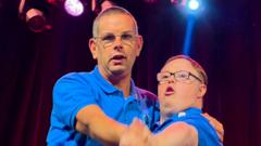 Image from linked report: Music group with learning difficulties fulfils late MP's Broadway dream