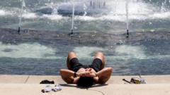Source-feed image associated with 'It's so hot' - Dangerous hot weather grips parts of the US