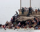 Source-feed image associated with Spain sends extra troops and police to Ceuta after thousands of migrants arrive
