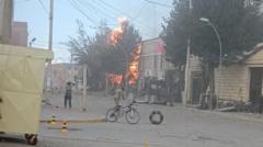 Source-feed image associated with At least two dead in blast at Bolivia military barracks