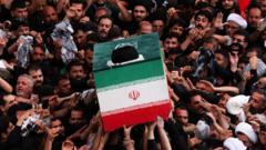 Source-feed image associated with Khamenei's coffin carried through Shia shrines as ceremonies held in Iraq