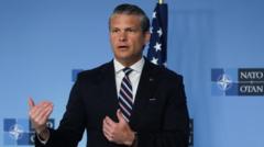 Source-feed image associated with Hegseth renews Nato criticism and says US will review presence in Europe