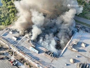 Source-feed image associated with Russian and Ukrainian attacks kill 5 a day after deadly shopping mall drone strike