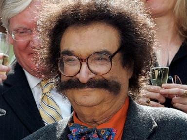 Source-feed image associated with Gene Shalit, longtime 'Today' show movie critic with bushy hair and massive mustache, dies at 100