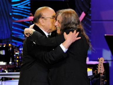Source-feed image associated with Barry Manilow, Patti Smith, Carlos Santana and more mourn the death of Clive Davis