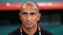 Source-feed image associated with Tunisia sack head coach just one game into World Cup