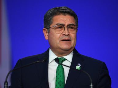 Source-feed image associated with Former President Juan Orlando Hernández returns to Honduras after arrest warrant suspended