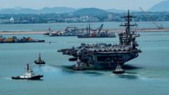 Source-feed image associated with US aircraft carrier docks near Thai beach resort Pattaya after record 250 days at sea