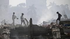 Source-feed image associated with Rescuers search rubble for survivors as Venezuela earthquakes kill at least 235