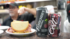 Source-feed image associated with Why a famous Montreal sandwich shop has been forced to swap its soda