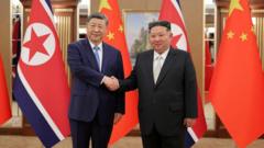 Source-feed image associated with Xi Jinping and Kim Jong Un vow stronger ties as North Korea visit wraps up