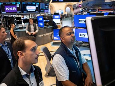 Source-feed image associated with Asian shares mostly decline as bond market pressure mounts