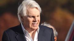 Source-feed image associated with Ex-Abercrombie & Fitch chief fit to stand trial in sex trafficking case, judge says