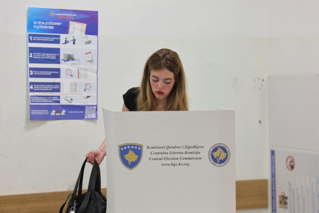 Source-feed image associated with Initial results show Kurti's party wins most votes in Kosovo's early election