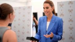 Source-feed image associated with Watch: Catherine gives out tickets and meets public in surprise Wimbledon visit