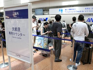 Source-feed image associated with Tropical storm hits Tokyo area, leaving thousands without power before moving west