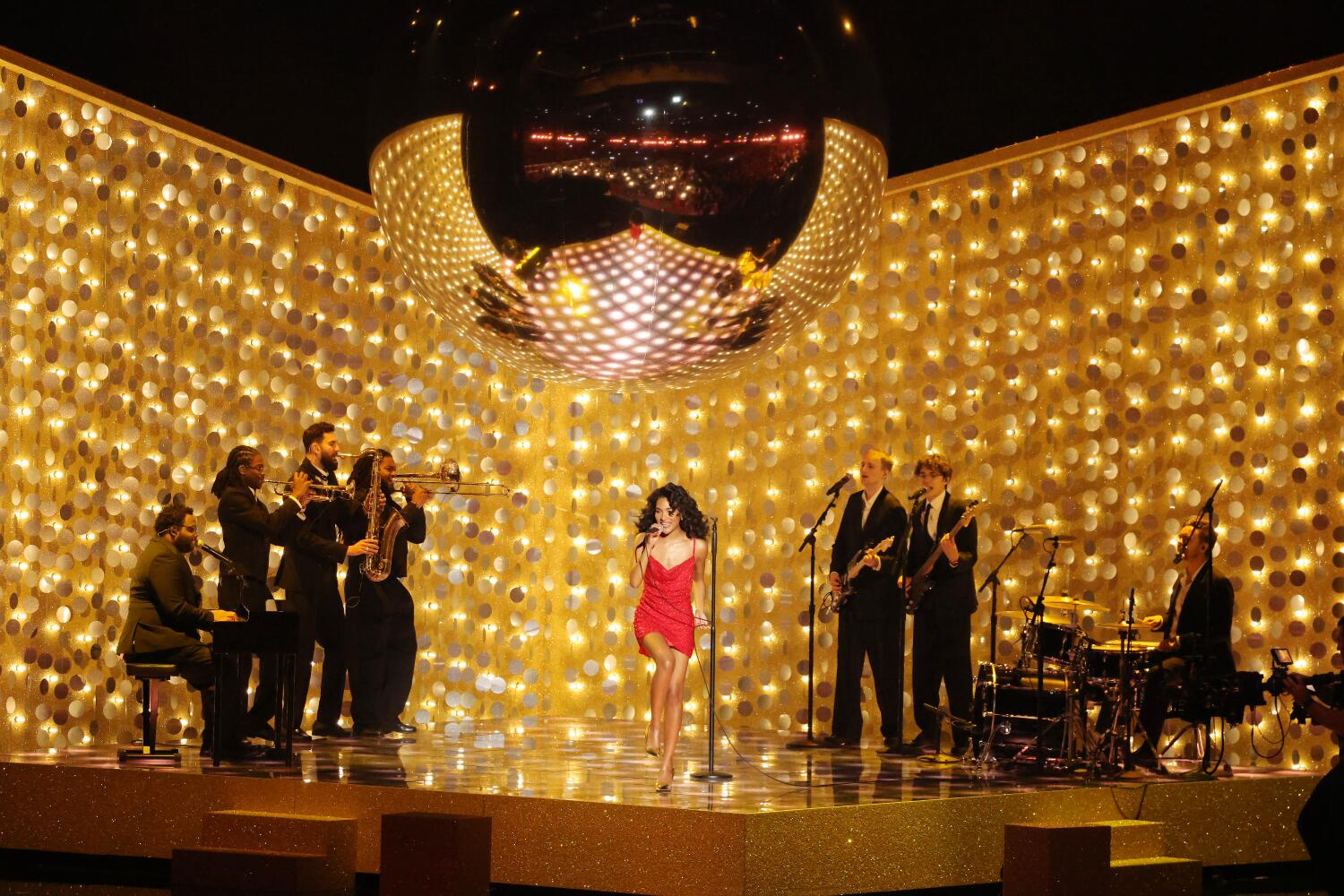 Source-feed image associated with Olivia Dean sings for lovers, fighters and immigrant families at Crypto.com Arena