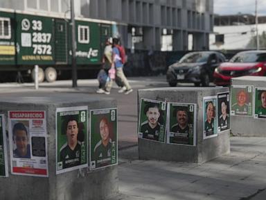 Source-feed image associated with With World Cup in Guadalajara, families of Mexico's disappeared turn loved ones into soccer stickers