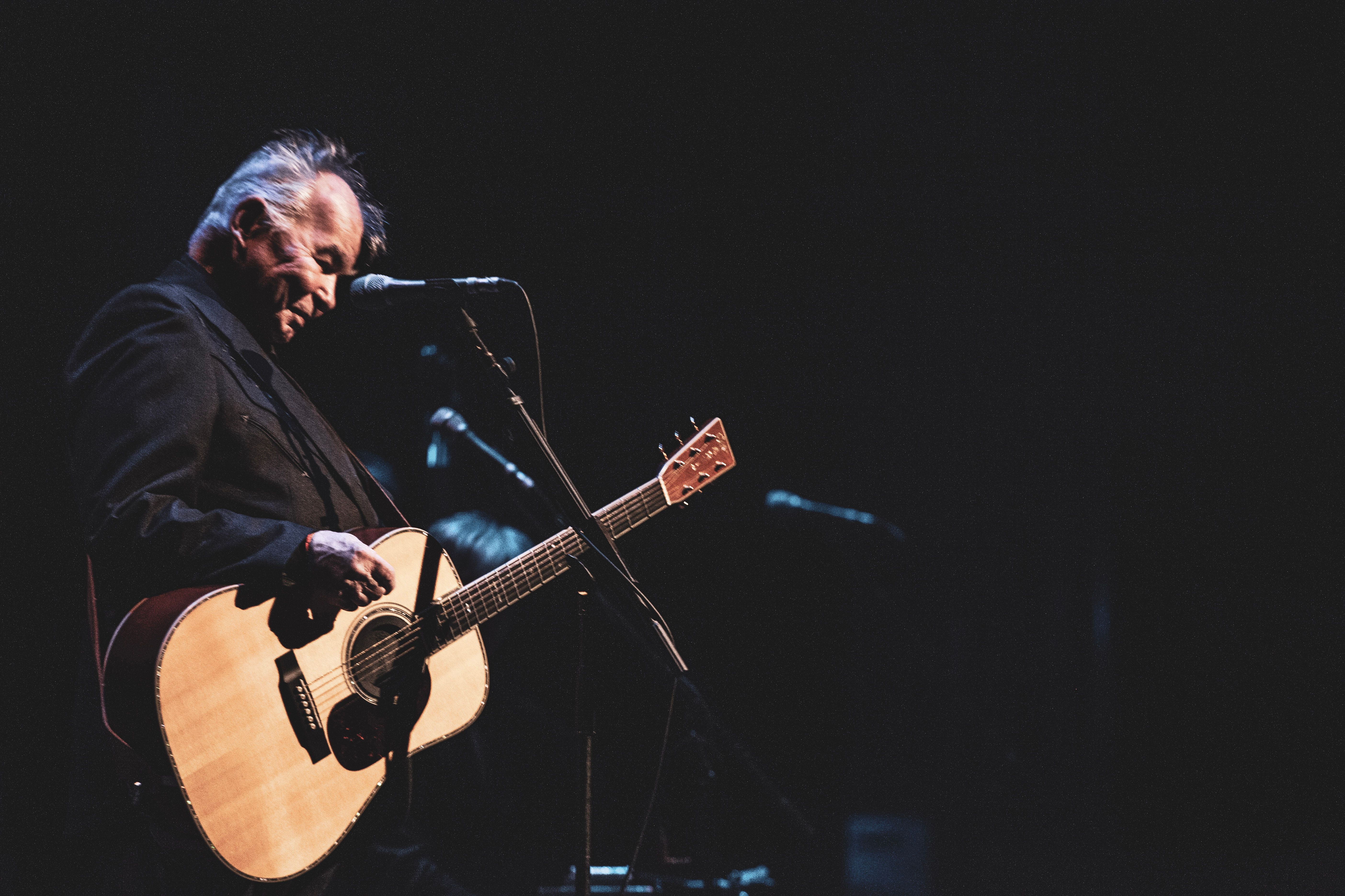 Source-feed image associated with Listen to an Unvaulted John Prine Song From Archival Album Found Dogs