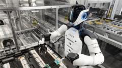 Source-feed image associated with Humanoid robots 'the future' of car making, says BMW