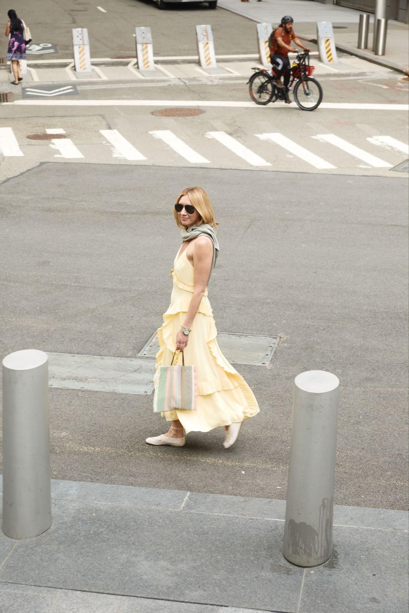 Source-feed image associated with 10 Chic City Outfits That Capture the Energy of Summer—with a Modern Twist