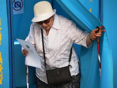 Source-feed image associated with Kazakhstan votes in parliamentary election expected to strengthen president’s grip on power