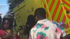 Source-feed image associated with Three in hospital after fire and crush at festival in London