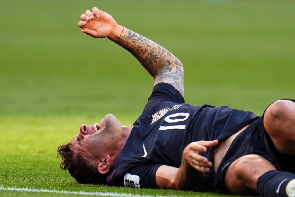 Source-feed image associated with U.S. star Christian Pulisic fractured leg in World Cup loss to Belgium