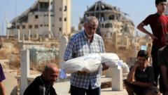Source-feed image associated with Israeli strikes in Gaza kill 12, including family of six, medics say