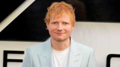 Source-feed image associated with Ed Sheeran fined for failing to insure Aston Martin