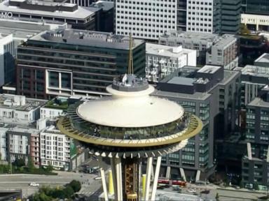 Source-feed image associated with WATCH: Daredevils scale and jump from Space Needle in Seattle