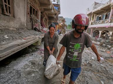 Source-feed image associated with Flood rescue enters fourth day in Nepal-China border as weather hampers air operations