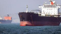 Source-feed image associated with Trump says Iran will be 'hit very hard' if Hormuz Strait not open soon as oil prices fall