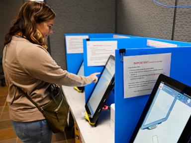 Source-feed image associated with Georgia's vote-counting method will soon be banned. Lawmakers will try to find a fix this week