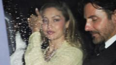 Source-feed image associated with In pictures: Stars and fans celebrate Taylor and Travis's wedding