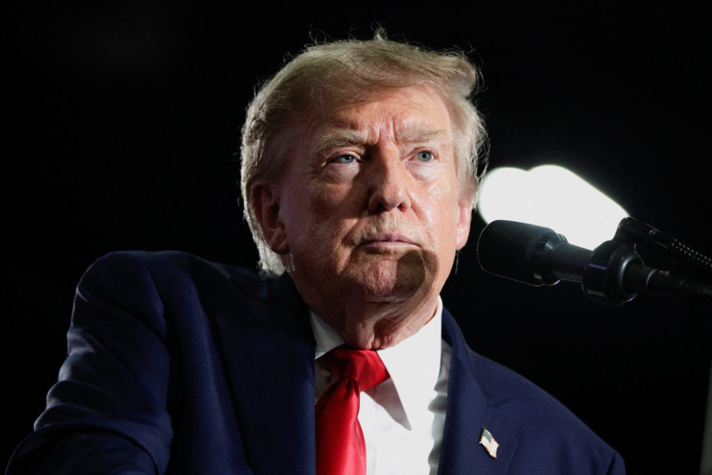 Source-feed image associated with Trump issues new threats to Canada as trade war escalates