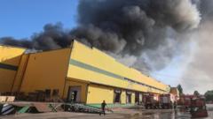 Source-feed image associated with Nine killed in strikes on Kyiv, as Ukraine sinks Russian container ship