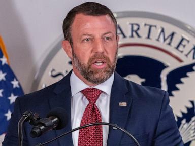 Source-feed image associated with Coast Guard plane carrying DHS Secretary Mullin makes emergency landing