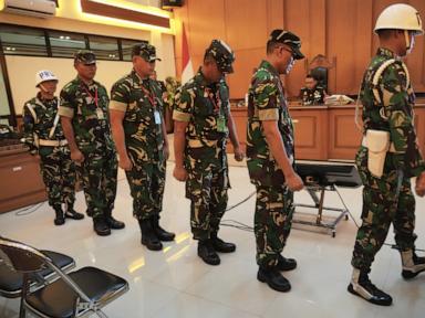 Source-feed image associated with Indonesian court finds 4 military members guilty of acid attack on activist, sends them to prison