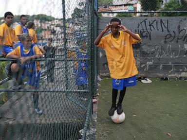 Source-feed image associated with Brazilian players from a Rio favela find hope and opportunities thanks to soccer