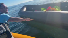 Image from linked report: Anti-migrant activist charged after dinghy slashed in Channel