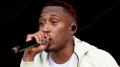 Source-feed image associated with Rapper Yung Filly tells trial 'vibes were good' with woman who accuses him of rape