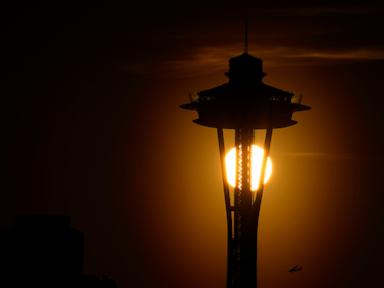Source-feed image associated with Seattle police seek two men who parachuted from the Space Needle