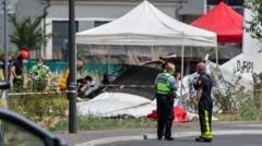 Source-feed image associated with Eleven killed after plane carrying skydivers crashes in eastern France