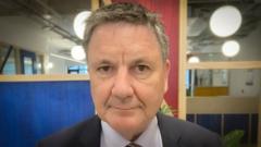 Source-feed image associated with UK's top data and AI regulator quits after 'inappropriate' humour