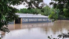 Source-feed image associated with At least two dead in Texas floods ravaging same area where campers died