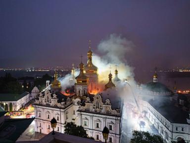Source-feed image associated with Russian attack sets fire to centuries-old religious site in Kyiv and kills 5 in Kharkiv