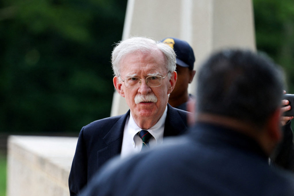 Source-feed image associated with Ex-national security adviser John Bolton pleads guilty to illegally retaining classified information