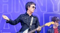 Source-feed image associated with Johnny Marr to auction guitars he played with The Smiths and Billie Eilish