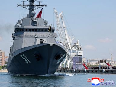 Source-feed image associated with North Korea's Kim claims progress on nuclear-armed navy as new warship is placed into service